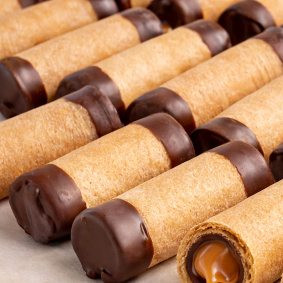 Minibarquillos Dolcebarquillo rellenos con manjar y cubiertos con chocolate